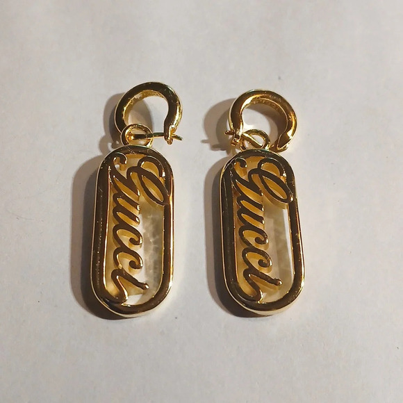 AUTHENTIC GUCCI CURSIVE NAME GOLD TONE DANGLING EARRINGS - Picture 1 of 10